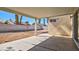 The backyard patio includes a large covered area and a view of the block wall at 4653 Califa Dr, Las Vegas, NV 89122