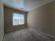Empty bedroom shows window with horizontal blinds allowing natural light at 4748 Terra Linda Ave, Las Vegas, NV 89120
