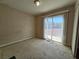 Bedroom featuring sliding glass door and closet at 4748 Terra Linda Ave, Las Vegas, NV 89120