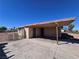 Single-story home with a covered carport, fenced yard, and low-maintenance desert landscaping at 4748 Terra Linda Ave, Las Vegas, NV 89120
