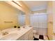 Bathroom features a double sink vanity and a tub with a shower curtain at 4835 Willow Glen Dr, Las Vegas, NV 89147