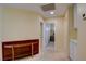 Neutral hallway with built in cabinets and a decorative table at 4835 Willow Glen Dr, Las Vegas, NV 89147