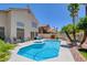 Enjoy a refreshing dip in the pool, perfect for hot summer days at 4835 Willow Glen Dr, Las Vegas, NV 89147