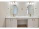 Bathroom with dual vanities, modern fixtures, and ample counter space at 5529 Cranwood Ct, Las Vegas, NV 89130