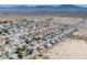 Expansive aerial view of a desert community with mountain views at 565 Mazelle Ln, Pahrump, NV 89060