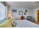 Inviting bedroom features a queen-size bed, natural light, and serene atmosphere at 5831 Medallion Dr # 103, Las Vegas, NV 89122