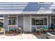 Inviting home exterior with a charming seating area and a beautiful garden view at 5831 Medallion Dr # 103, Las Vegas, NV 89122