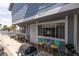 Attractive home featuring an outdoor seating area with a well-maintained facade and landscaping at 5831 Medallion Dr # 103, Las Vegas, NV 89122