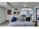 Cozy living room with stylish decor, open to the kitchen and dining area, perfect for gatherings at 5831 Medallion Dr # 103, Las Vegas, NV 89122