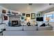 Inviting living room featuring a fireplace, comfortable seating, and decorative artwork at 5831 Medallion Dr # 103, Las Vegas, NV 89122