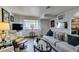 Stylish living room with comfortable seating, modern décor, and ample natural light at 5831 Medallion Dr # 103, Las Vegas, NV 89122