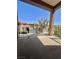 Spacious balcony with iron railing and views of the surrounding neighborhood homes at 6545 Netherseal Ave, Las Vegas, NV 89139