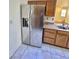 Well-equipped kitchen featuring a stainless steel refrigerator and coordinated countertops at 6545 Netherseal Ave, Las Vegas, NV 89139