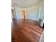 Bright living area with wood floors, arched doorway and neutral walls at 6545 Netherseal Ave, Las Vegas, NV 89139