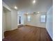 Spacious living room featuring hardwood floors and lots of natural light at 6545 Netherseal Ave, Las Vegas, NV 89139