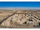 A scenic aerial view showcasing the community and its proximity to the city skyline and desert landscape at 68 E Serene Ave # 224, Las Vegas, NV 89123