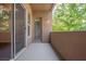 Private balcony area with neutral stucco and access to the exterior view at 68 E Serene Ave # 224, Las Vegas, NV 89123