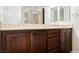 Bathroom features a double sink vanity and shower with glass door at 68 E Serene Ave # 224, Las Vegas, NV 89123