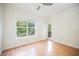 Well-lit bedroom with hardwood floors and outdoor access provides great light at 68 E Serene Ave # 224, Las Vegas, NV 89123