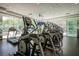 Bright community gym with treadmills and elliptical machines, and large windows to see outside at 68 E Serene Ave # 224, Las Vegas, NV 89123