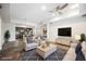 Bright living room featuring tile floors, recessed lighting, and modern furnishings at 68 E Serene Ave # 224, Las Vegas, NV 89123
