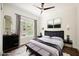 Bedroom with stylish decor, neutral tones, and bright natural light at 68 E Serene Ave # 224, Las Vegas, NV 89123