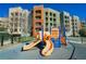 Community playground with modern play equipment and colorful surroundings, great for families at 68 E Serene Ave # 224, Las Vegas, NV 89123
