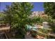 Swimming pool surrounded by landscaped grounds; an ideal spot for leisure and relaxation at 68 E Serene Ave # 224, Las Vegas, NV 89123