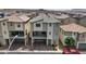 Aerial view of desert neighborhood highlighting the surrounding community and a red car at 6848 Sunflower Fields St, North Las Vegas, NV 89086