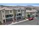 Aerial view of desert neighborhood highlighting the surrounding community and a red car at 6848 Sunflower Fields St, North Las Vegas, NV 89086
