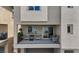 Balcony with patio furniture, plants, and a view of the surrounding neighborhood at 6848 Sunflower Fields St, North Las Vegas, NV 89086