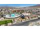 Aerial view of community park, pool, playground, and basketball court at 6848 Sunflower Fields St, North Las Vegas, NV 89086