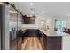 Bright kitchen features stainless steel appliances, granite countertops, and plenty of cabinet space at 6848 Sunflower Fields St, North Las Vegas, NV 89086