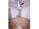 This bedroom features luxury vinyl flooring and a ceiling fan at 7123 Kenwood St, Las Vegas, NV 89147