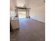 Spacious garage featuring laundry hookups and an automatic door at 7123 Kenwood St, Las Vegas, NV 89147