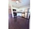 Well-equipped kitchen with stainless steel appliances and white cabinetry at 7123 Kenwood St, Las Vegas, NV 89147