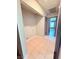 A laundry room showcasing tile flooring and easy plumbing hook ups at 7123 Kenwood St, Las Vegas, NV 89147