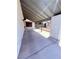 Covered patio with concrete flooring, neutral wall colors, and shaded area at 7123 Kenwood St, Las Vegas, NV 89147