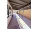 Covered patio with concrete flooring, neutral wall colors, and backyard views at 7123 Kenwood St, Las Vegas, NV 89147