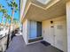 Welcoming condo entrance with a private balcony, offering a charming outdoor space with neighborhood views at 7135 S Durango Dr # 314, Las Vegas, NV 89113