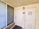 Apartment front door with house number, side window, and secure entry at 7135 S Durango Dr # 314, Las Vegas, NV 89113