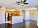 Open concept kitchen and living room with hardwood floors and ample natural light at 7135 S Durango Dr # 314, Las Vegas, NV 89113