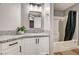 Stylish bathroom features granite counters, modern fixtures, and vanity storage space with a shower-tub combination at 7173 S Durango Dr # 307, Las Vegas, NV 89113