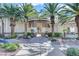 Community entrance walkway with lush greenery and scenic landscaping at 7173 S Durango Dr # 307, Las Vegas, NV 89113