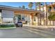 Community's gated entrance with security features and lush landscaping at 7173 S Durango Dr # 307, Las Vegas, NV 89113