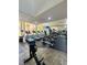 A community gym with modern exercise equipment and large windows for a bright workout space at 7173 S Durango Dr # 307, Las Vegas, NV 89113