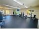 A spacious gym offers a variety of equipment including weight machines, punching bag, and exercise machines at 7173 S Durango Dr # 307, Las Vegas, NV 89113