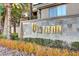 Elegant community signage surrounded by colorful plants and stone accents at 7173 S Durango Dr # 307, Las Vegas, NV 89113