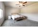 Bedroom with neutral wall paint, ceiling fan and bright window at 7302 Sunray Point St, North Las Vegas, NV 89084