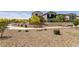 Well-maintained community featuring walking paths, desert landscaping, and open green spaces for recreation at 7302 Sunray Point St, North Las Vegas, NV 89084